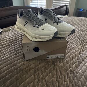 On Running Cloudstratus Shoes in Gray and Cream